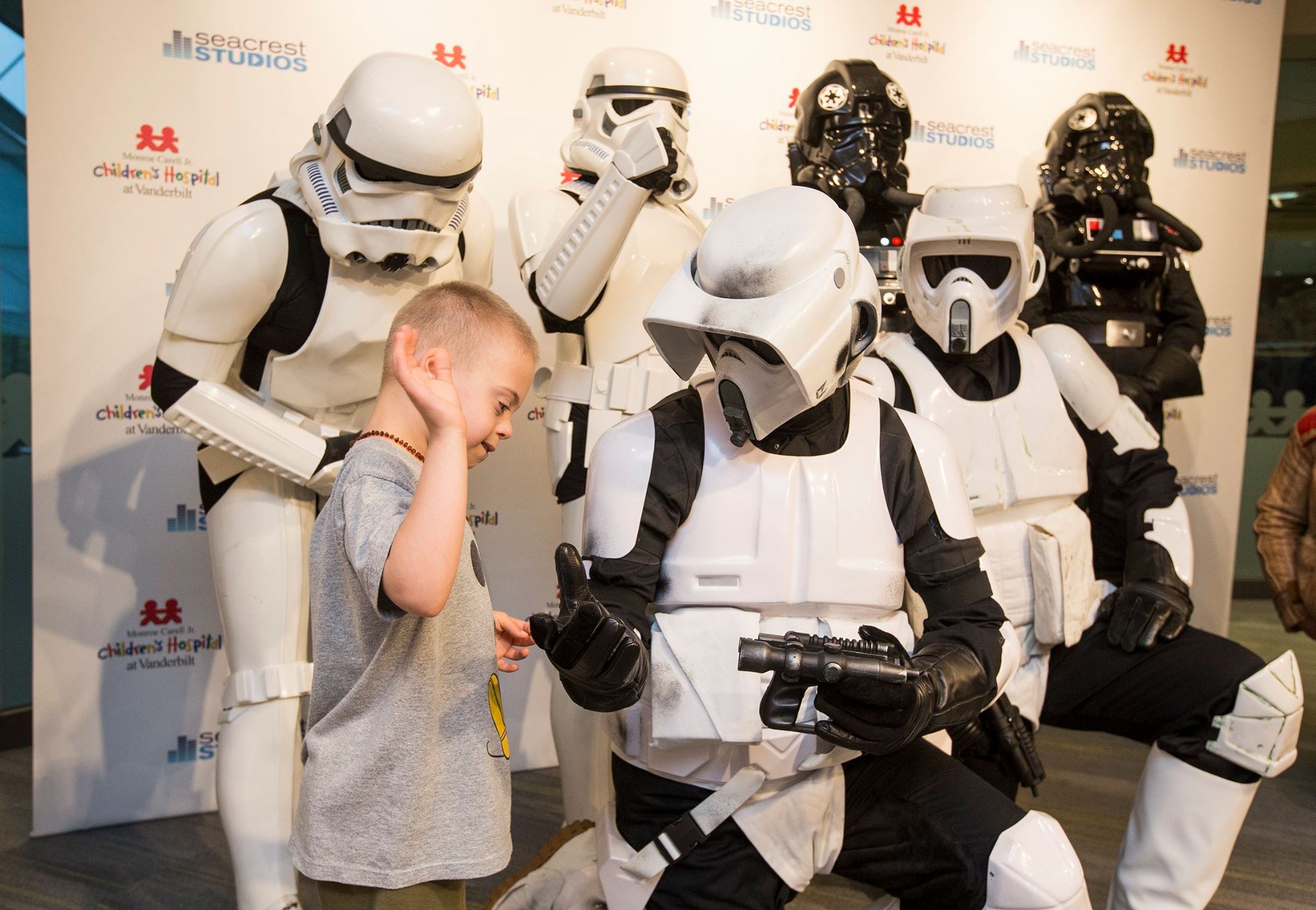A member of the 501st Legion wearing a highly accurate Stormtrooper costume at a charity event.